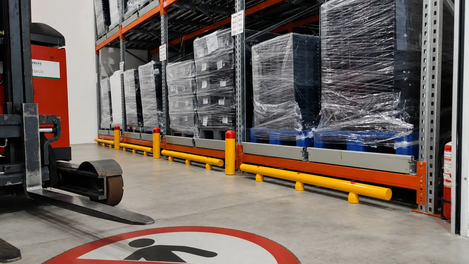 Low barrier beside racking and forklift traffic
