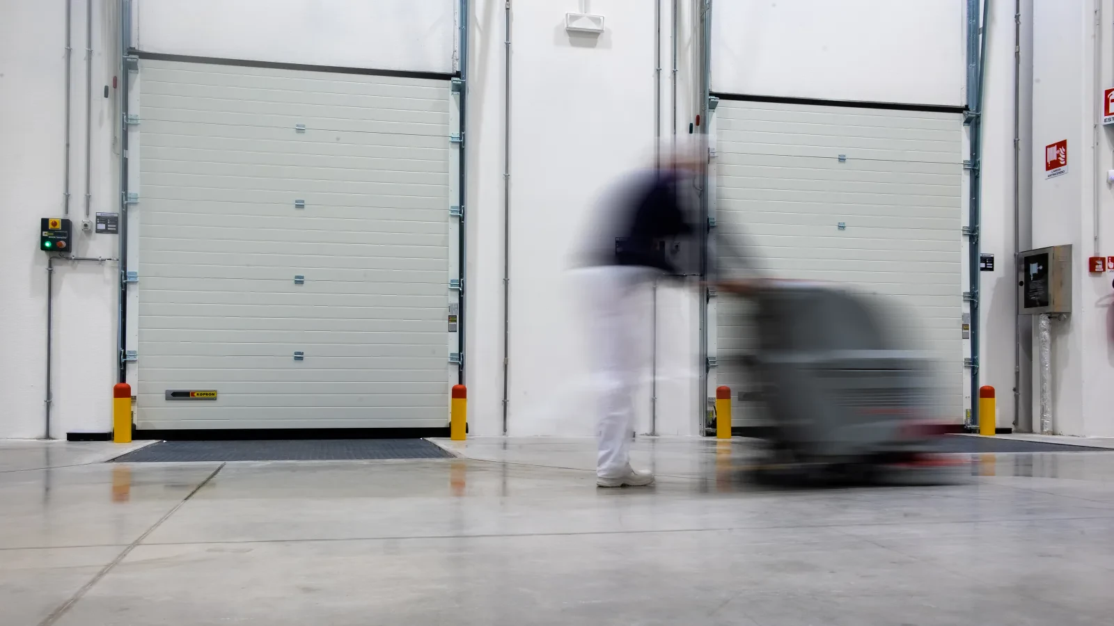 Controlled movement through a loading-bay door