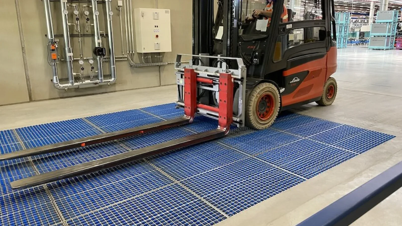 Forklifts and pallet trucks in operation