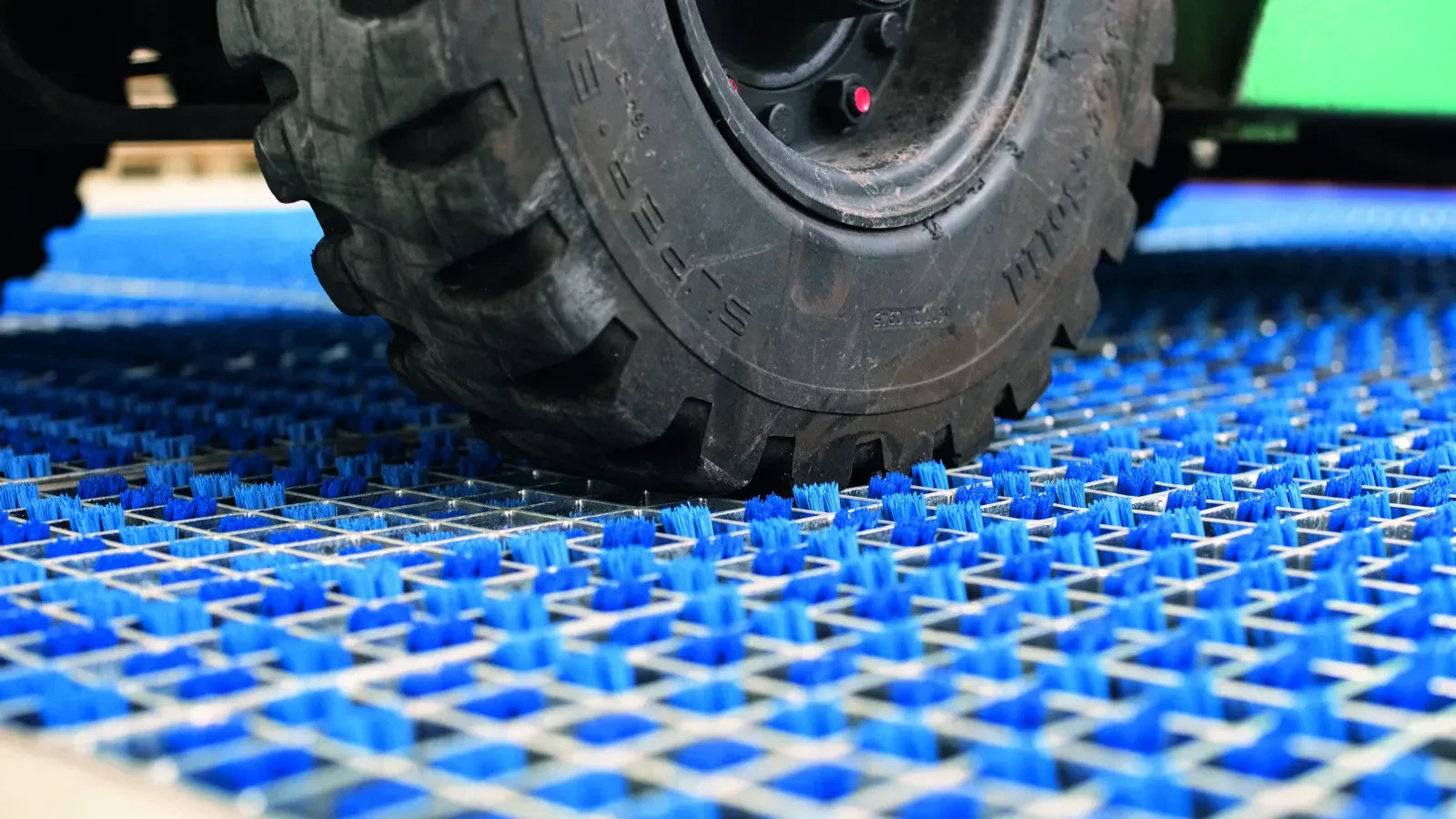 Active cleaning for wheels, rollers and soles